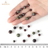 BEADNOVA Natural Dragon Blood Jasper Beads Natural Crystal Beads Stone Gemstone Round Loose Energy Healing Beads with Free Crystal Stretch Cord for Jewelry Making (6mm, 62-64pcs) 6mm